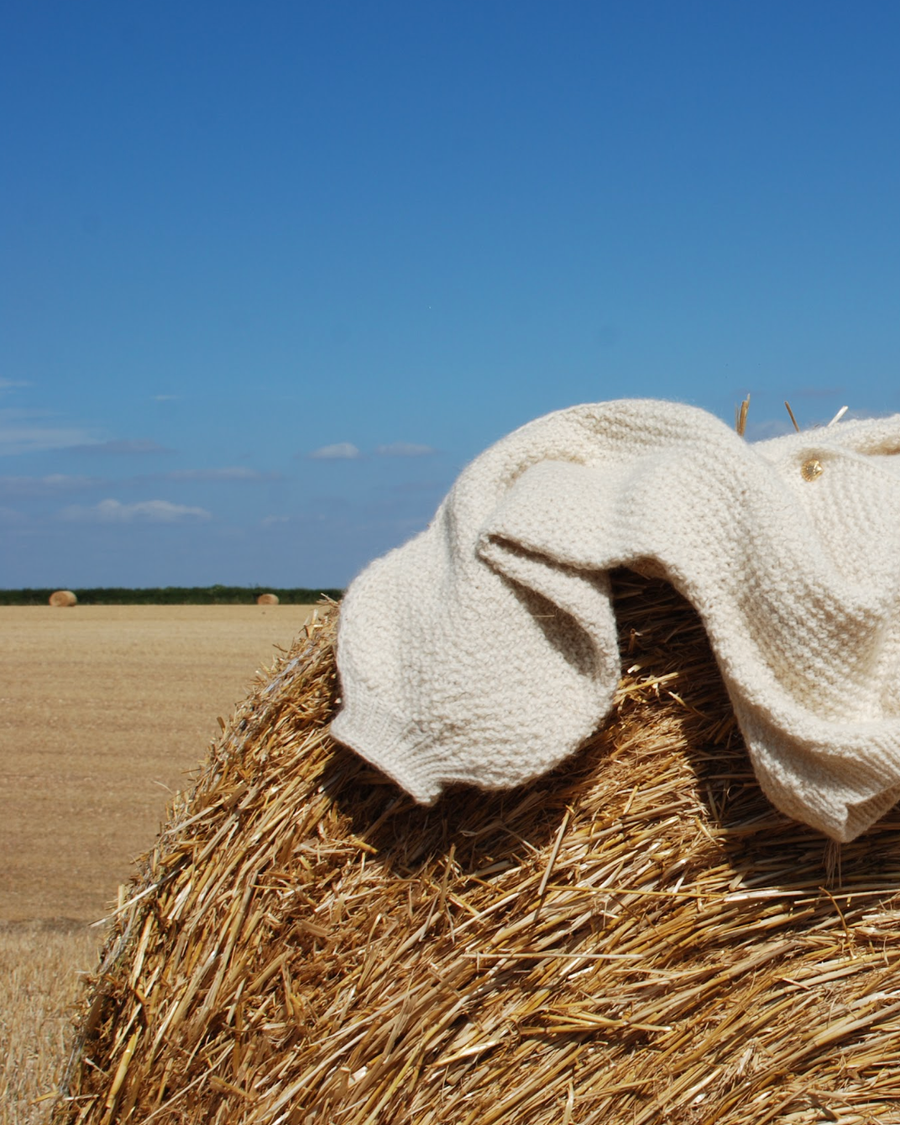 Beatrice Bayliss jumper on haybale