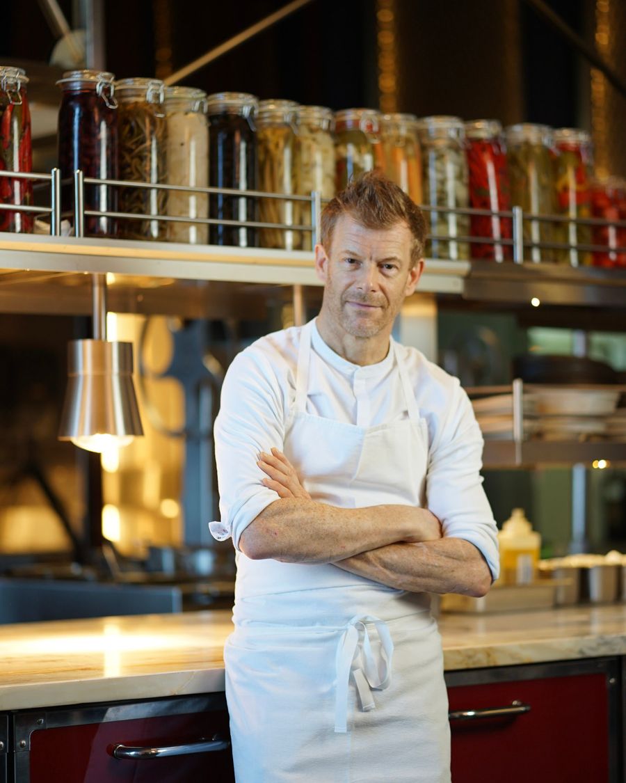 Tom Aiken in chef apron