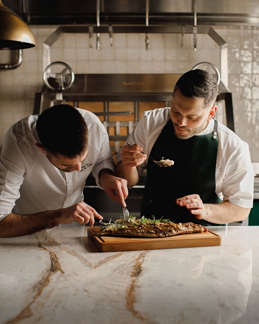 chefs cooking in kitchen